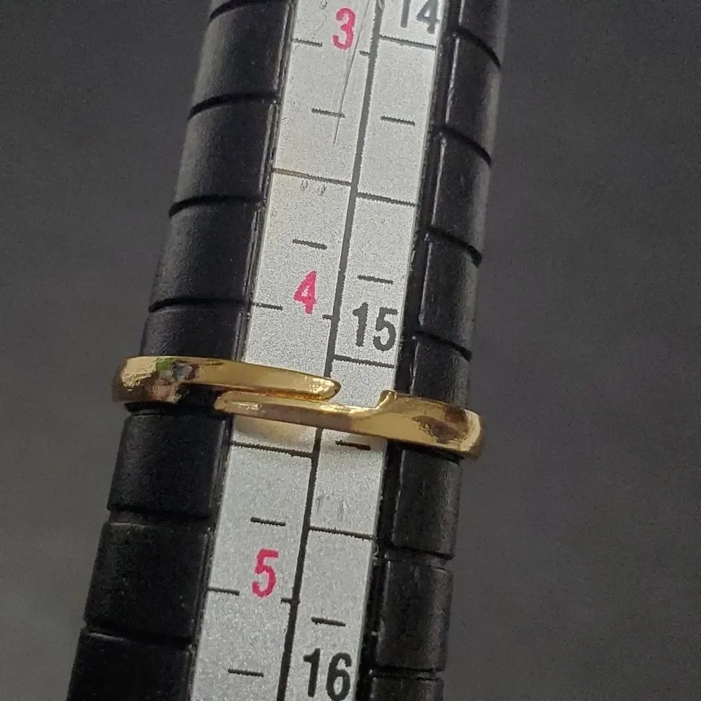 Set of 5 gold tone children's rings